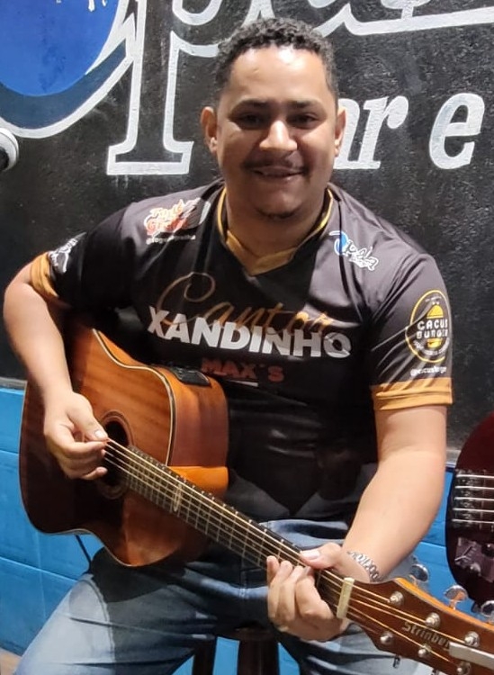 Xandinho cantor e banda